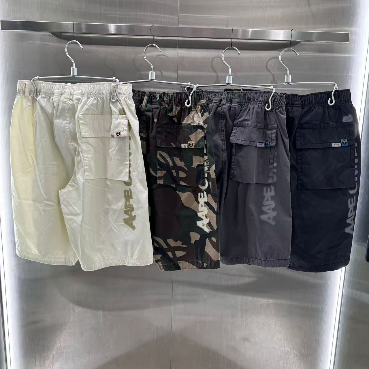 香港代購 專櫃正品 26春夏 Aape 男 AAPEUNVS 猿人徽章水洗做舊潮流迷彩工裝短褲D614