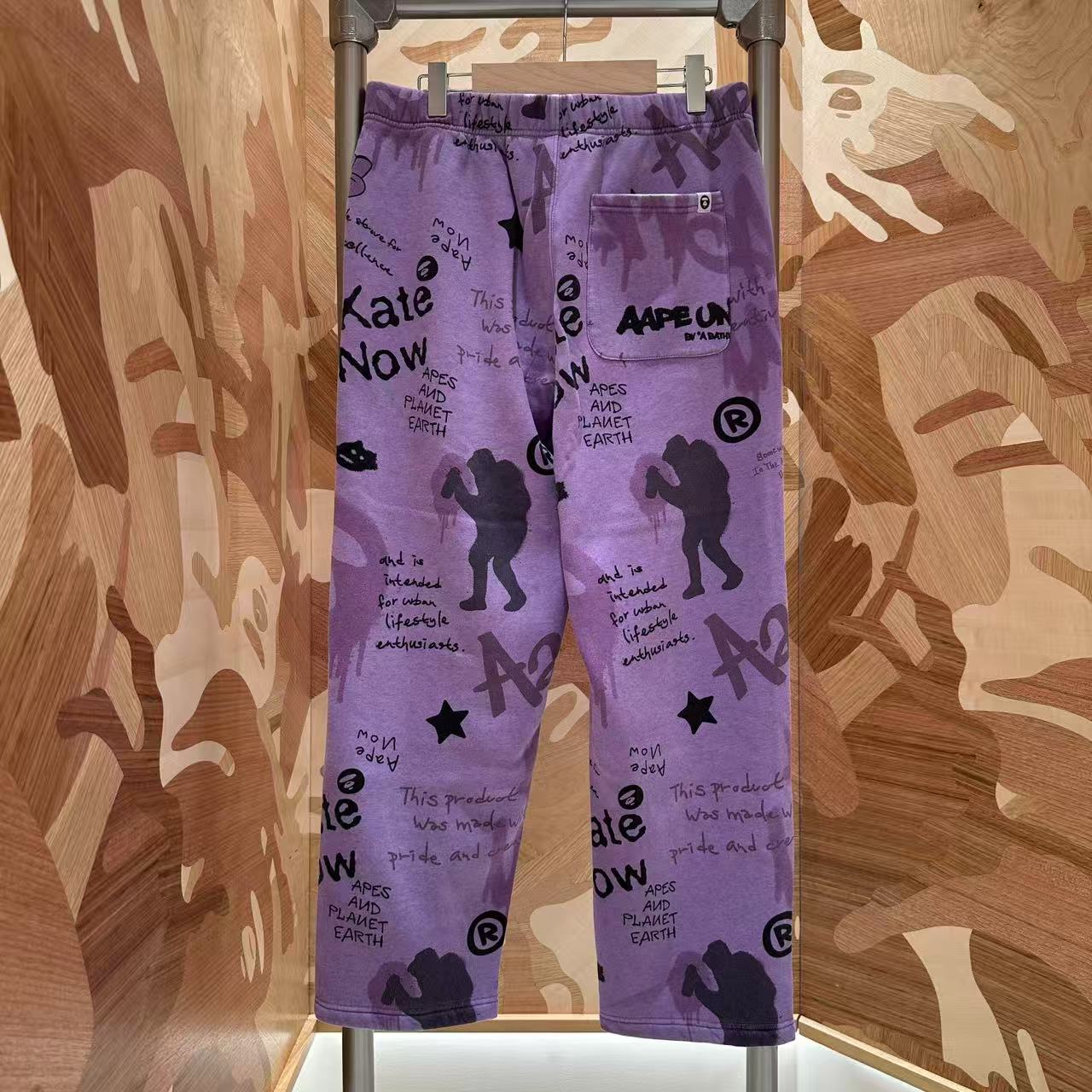 Aape 男装 26秋冬喷漆涂鸦满印水洗做旧加绒卫裤D663