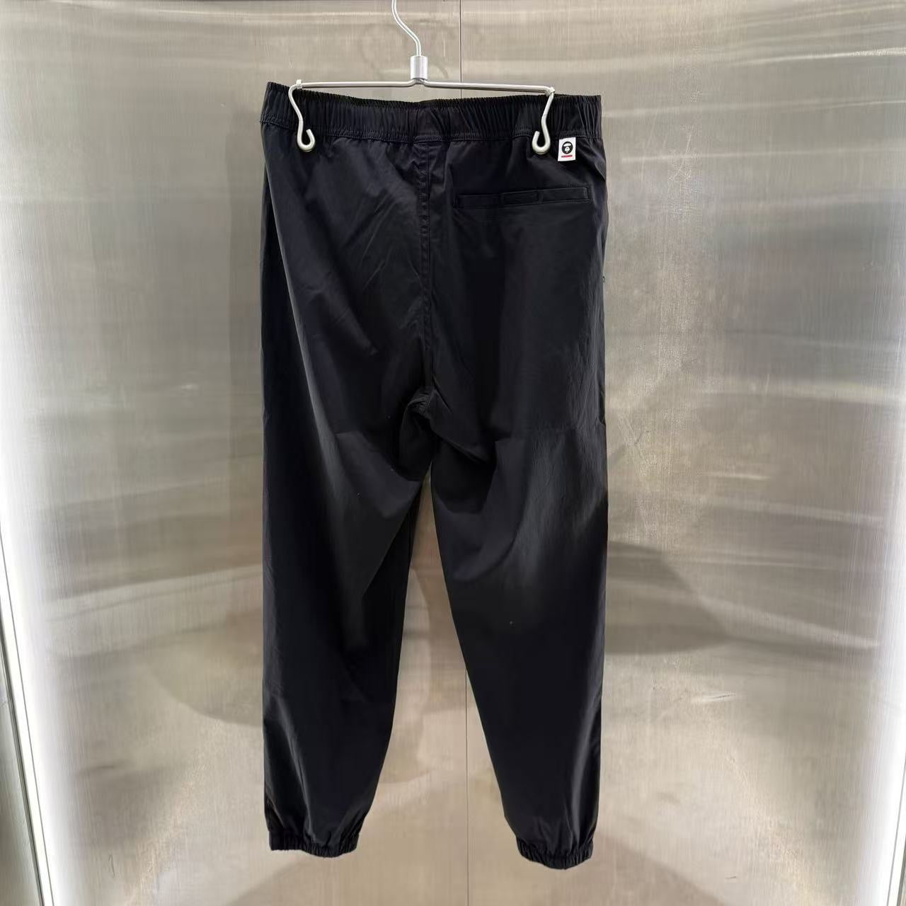 香港直郵 Aape 男裝  猿顏徽章字母印花束腳簡約休閑長褲6900