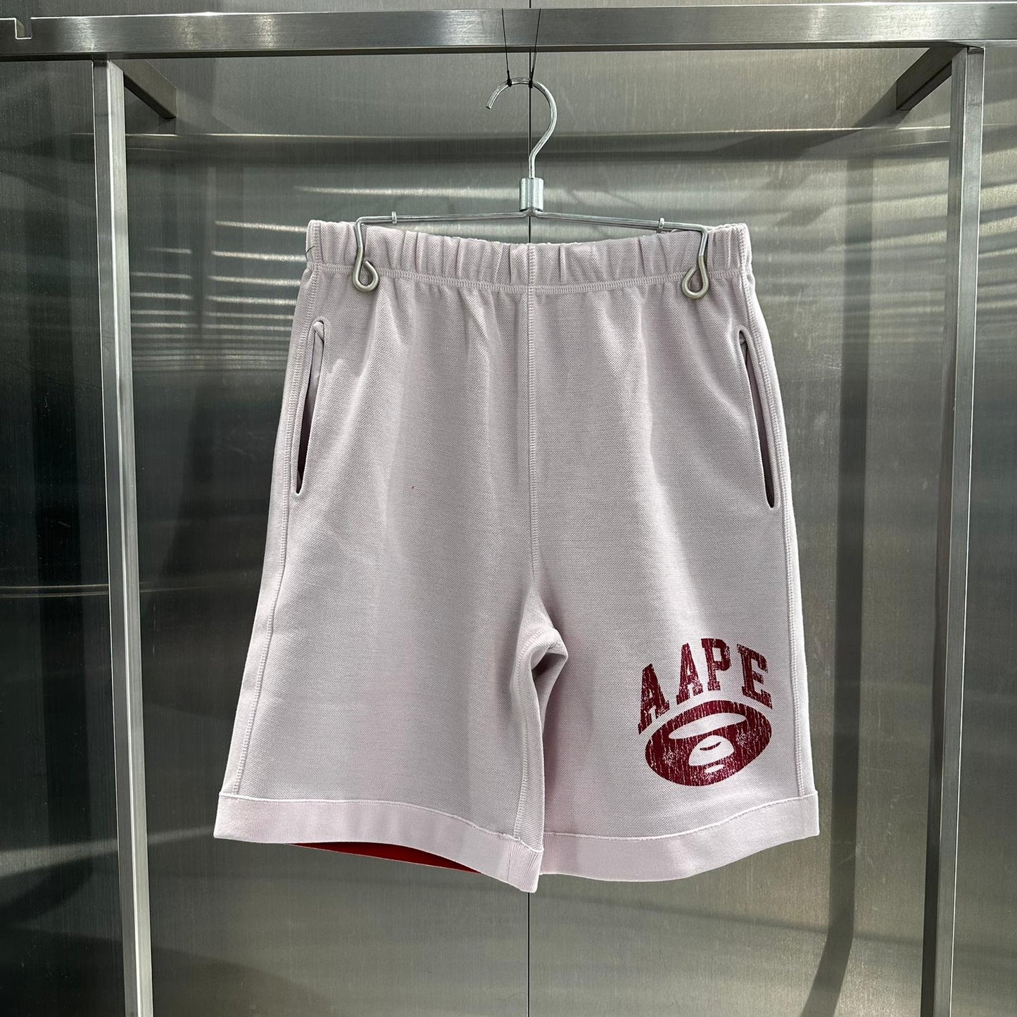 香港直郵 Aape 男裝 26春夏 爆裂紋字母猿人印花雙麵穿繫帶短褲C698