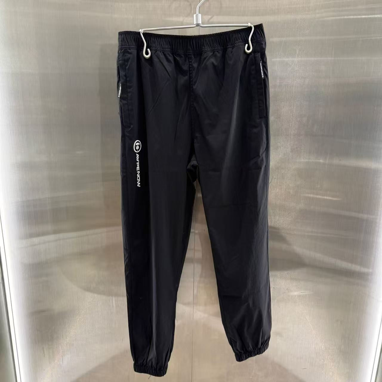 香港直郵 Aape 男裝  猿顏徽章字母印花束腳簡約休閑長褲6900