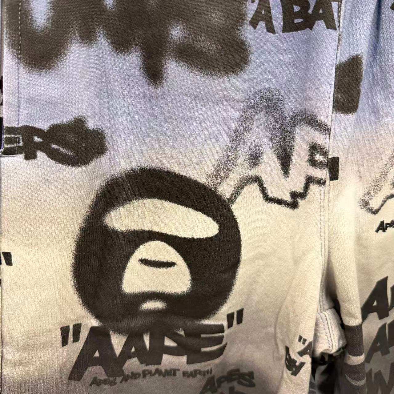 香港直郵 Aape 男裝 26春夏 AAPEUNVS 猿人字母塗鴉拼色街頭潮流個性短褲D618
